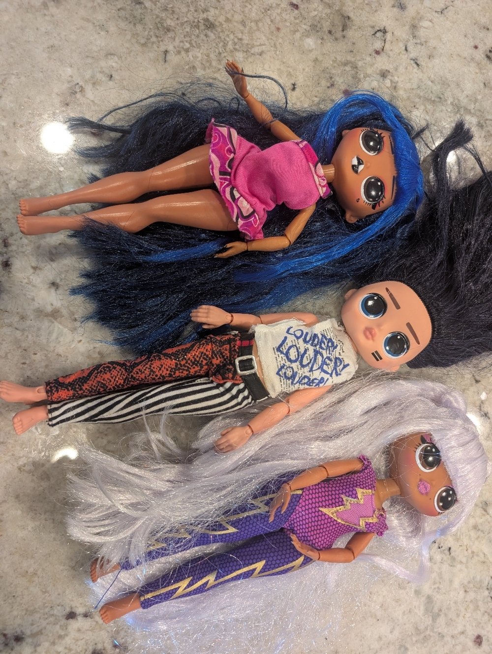 Three Lol Surprise Dolls